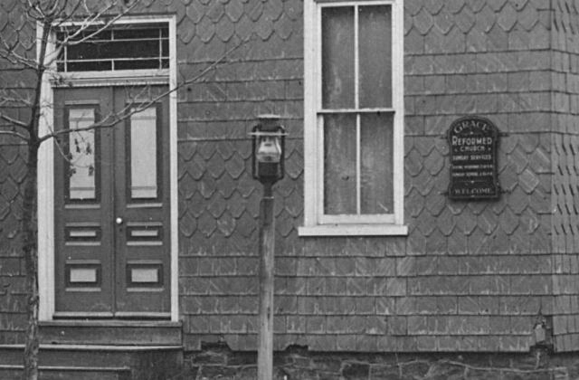 Kerosene lantern in front of church, West Point, PA